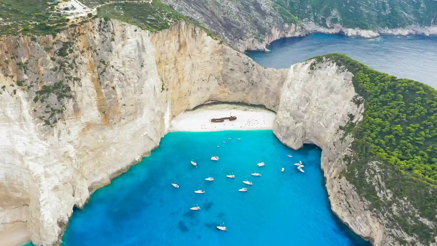 12 Unreal Places With Clearest Ocean Water in the World 7 Zakynthos Navagio Beach Greece