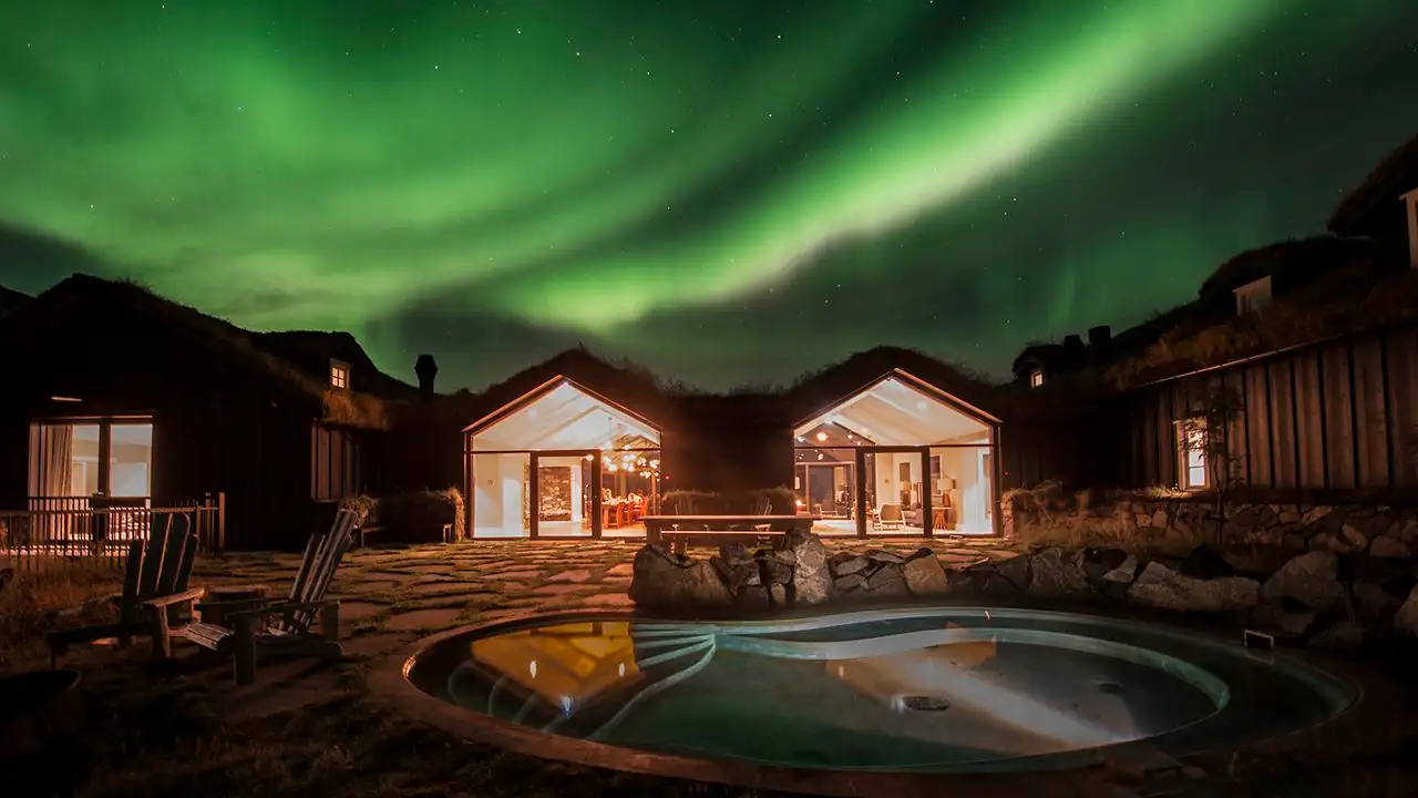 20+ best places to travel in december on a budget (Under $800) 22 Iceland Northern Lights Thermal Spas