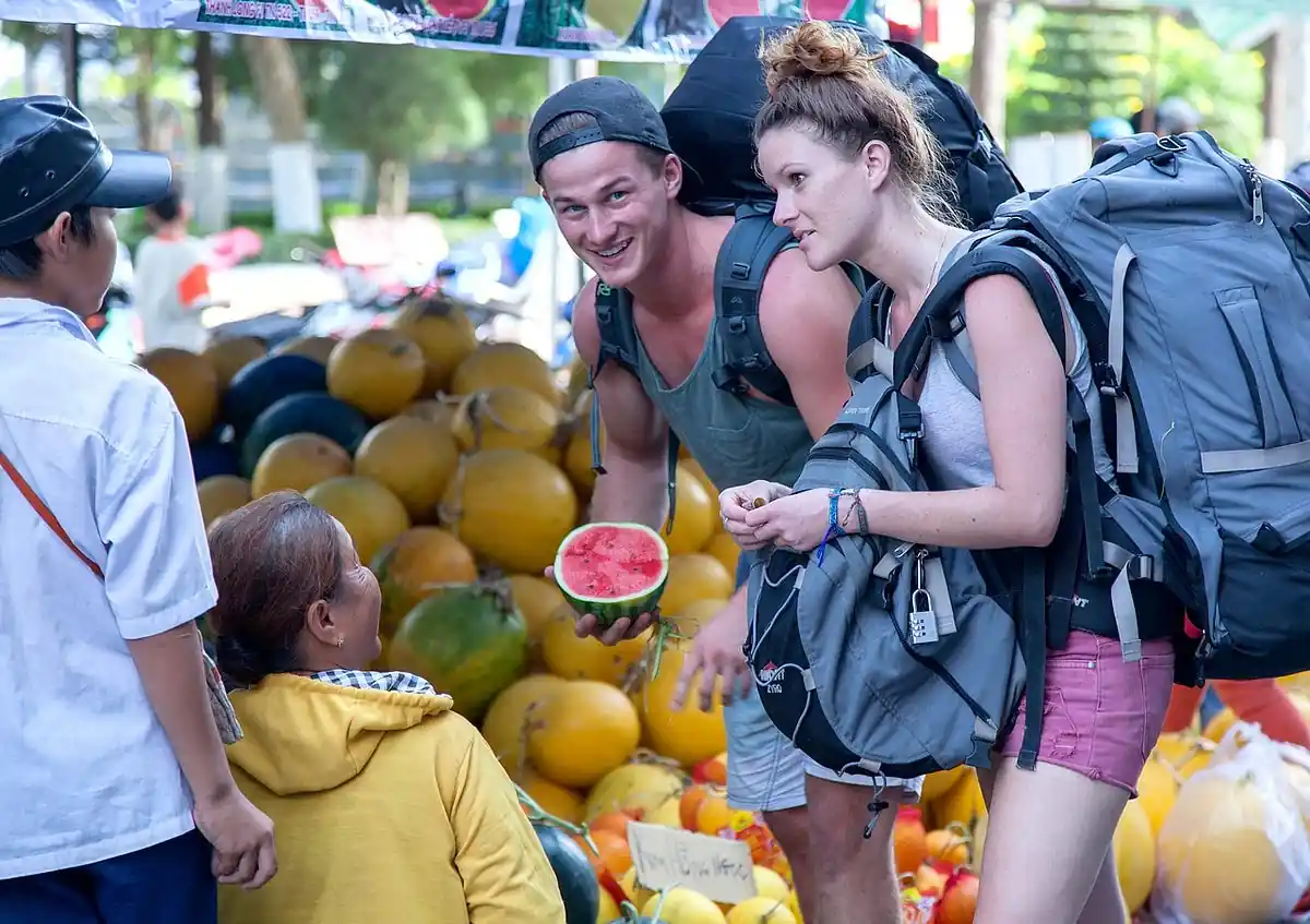 Is Traveling a Hobby in 2025? 7 Surprising Reasons Why It Is 3 bargaining in a local market 1
